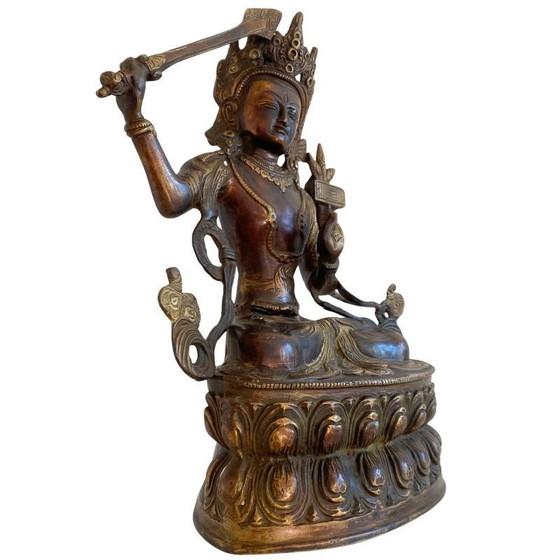 Antigua estatua tibetana de bronce de Manjushri con rastros de dorado lote 170 – Esculturas, Bronze (photo 2 of 15)