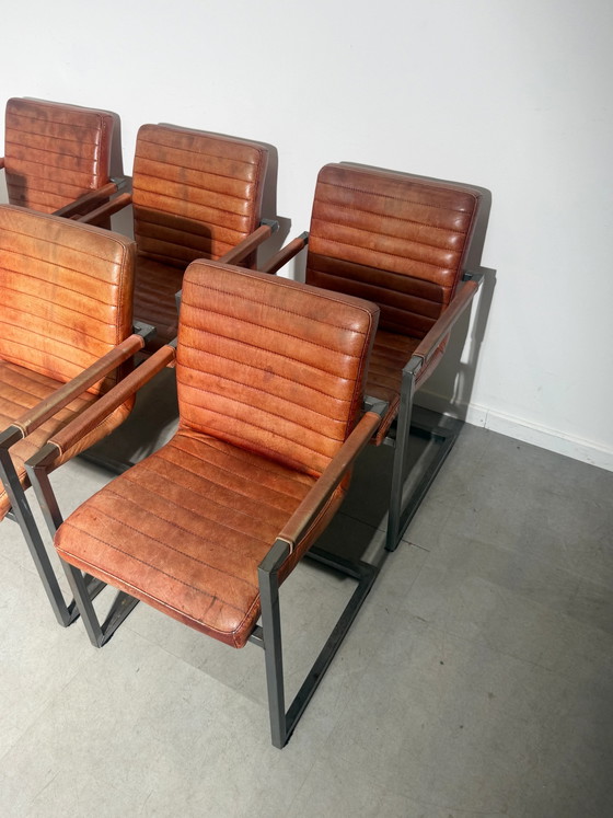 Set van zes cognac lederen eetkamerstoelen met armleuningen (photo 6 of 6)