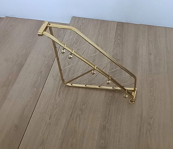 Image 1 of Fifties corner string coat rack