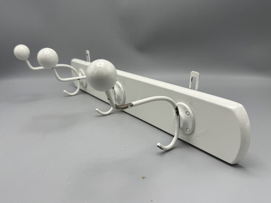 Image 1 of Mid - Century coat rack sleek and timeless design