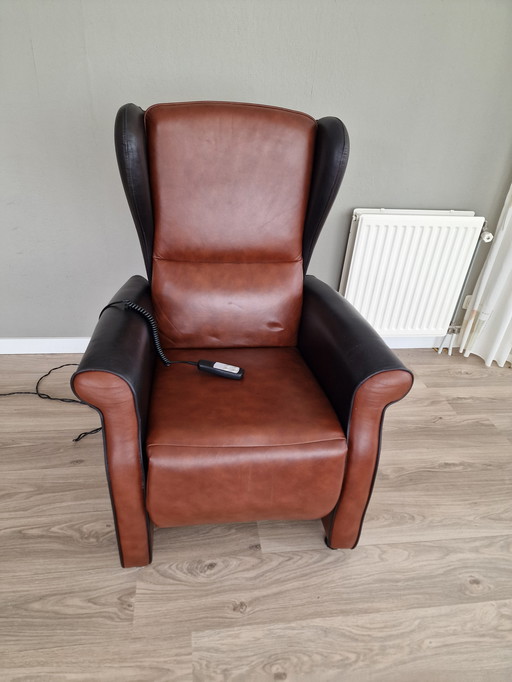 Elektrischer brauner Sessel