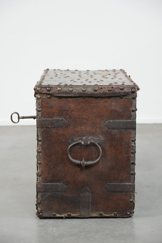 Image 1 of Antique 17th century chest/safe covered with leather and original key