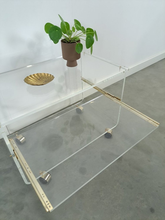 Image 1 of Space age plexiglas trolley met messing