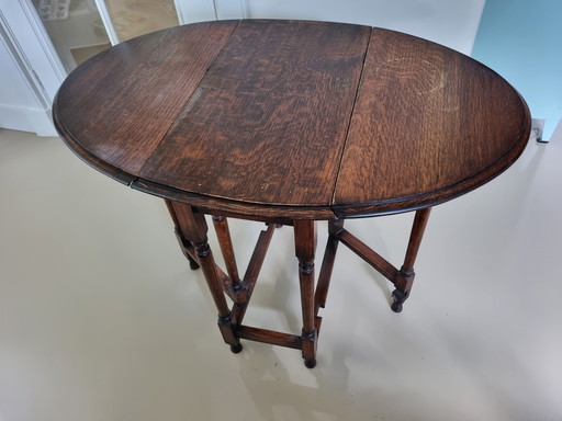 Antique oval folding side table