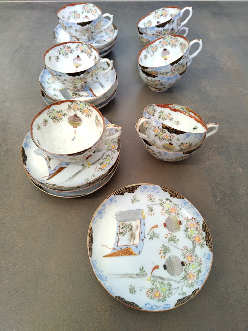 9 Chinese hand-painted tea cups and 12 matching saucers