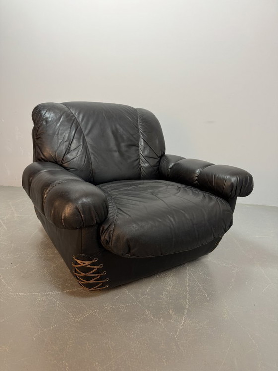 Image 1 of Beautiful Big Black Leather Postmodern Italian Design Space Age Lounge Chair with Brass Buttons and Playful Cord Lacing, 1970s.