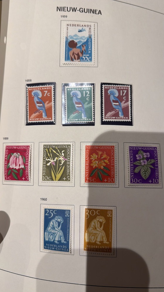 Briefmarkensammlung Neuguinea, Dekorative Objekte, Papier, Mehrfarbig (Foto 7 von 9)