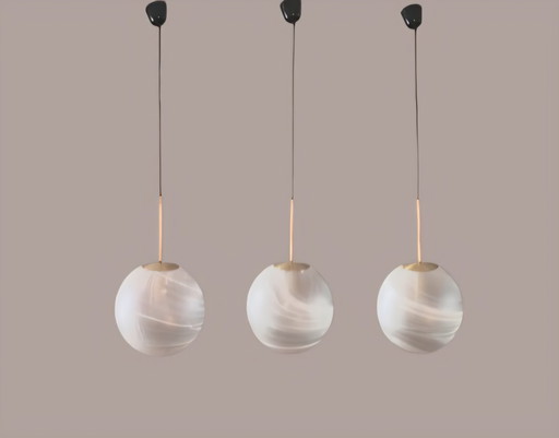 Set of three globe pendant lamps by Peill & Putzler.