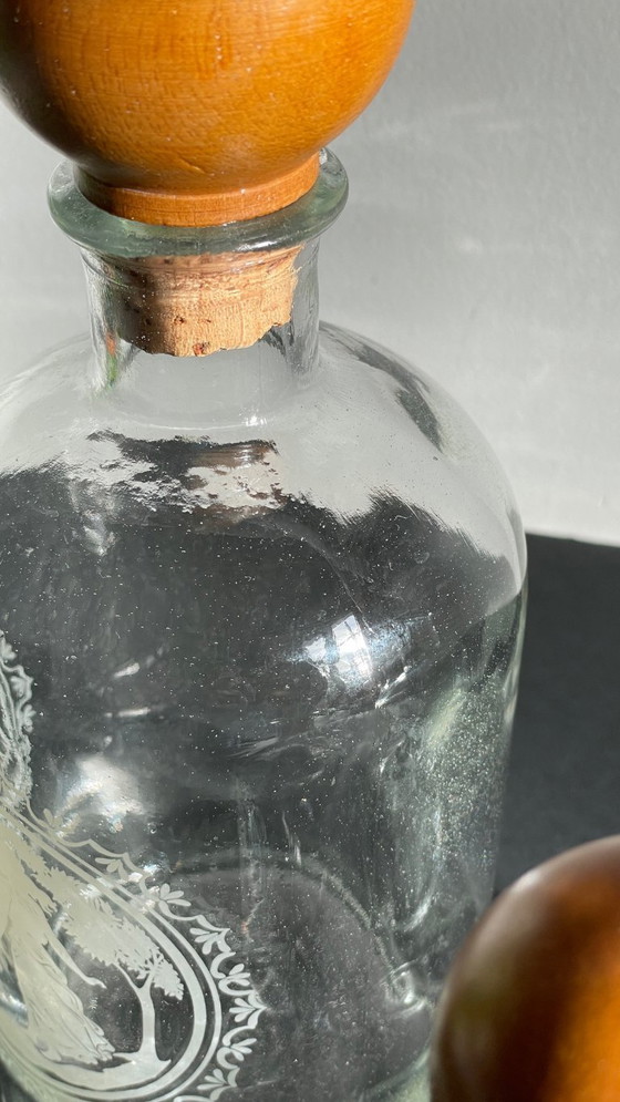 Image 1 of Vintage Engraved Glass and Wood Bottles