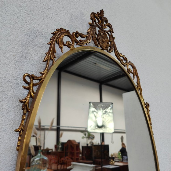 Image 1 of Vintage Goudkleurige Ovale spiegel kuifspiegel schouwspiegel. Koper 