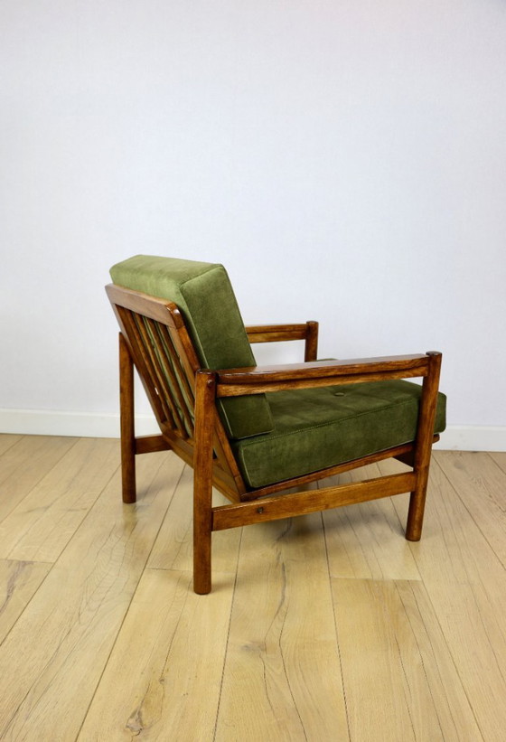 Image 1 of Wooden armchair designed by Z. Baczyk in a vintage style, upholstered in olive green velvet.