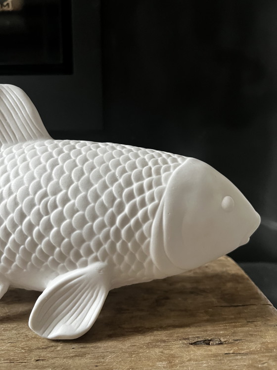 Image 1 of &K Amsterdam rinoceronte e pesce (koi)