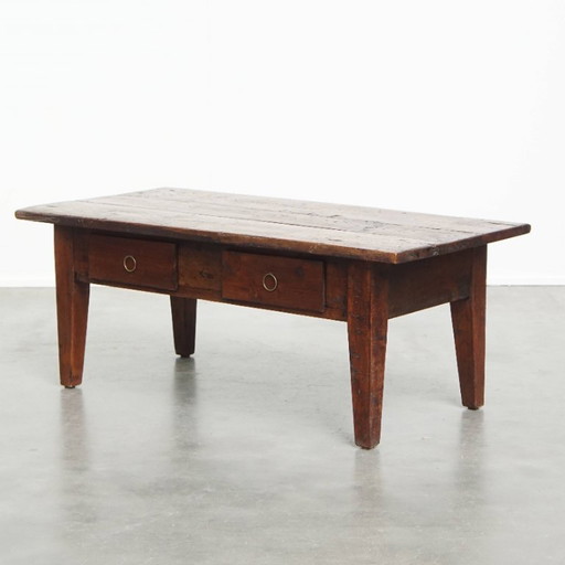 Practical antique French coffee table with striking colors