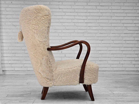 Image 1 of Jaren 60, Deens ontwerp van A. Christensen voor Slagelse Møbelværk, schapenvacht.