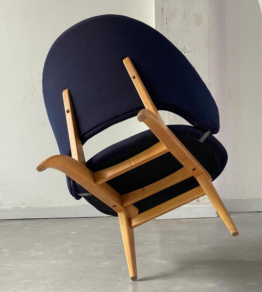 Un ensemble de 2 chaises longues Theo Ruth pour Artifort.