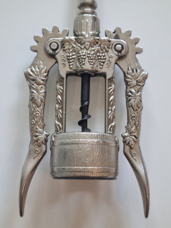 Prachtige vintage kurkentrekker met hendel van BREFA – met design van wijnbladeren en wijnvaten. (photo 3 of 6)