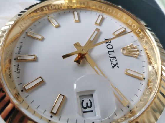Image 1 of Rolex, orologio da tavolo in ottone molto pesante.