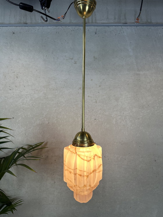 Image 1 of Art deco skyscraper - gemarmerde rosé opaline