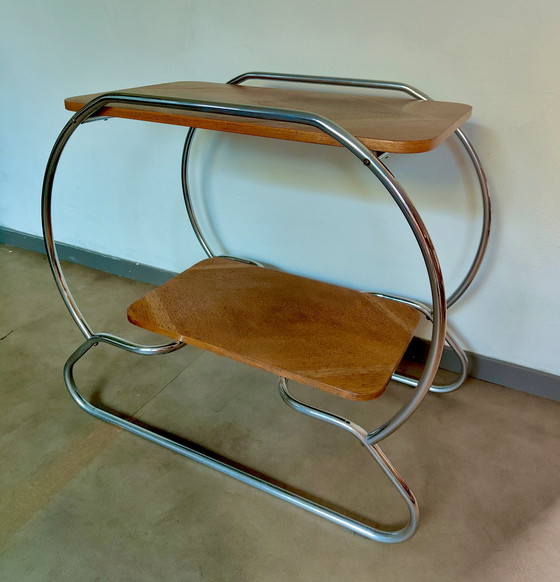 Image 1 of Mesa auxiliar Art Decó / Bauhaus - estructura tubular y tablero chapado
