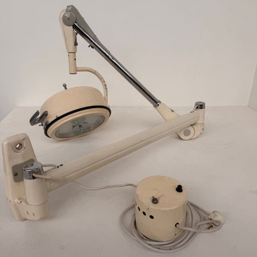 Chromophare wall lamp with folding arm