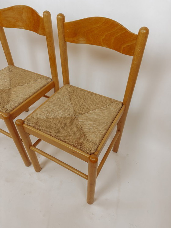 Image 1 of 2x houten Scandinavische eetkamerstoelen met biezen zitting