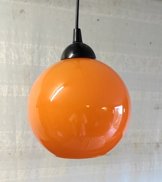 Image 1 of Lampada a sospensione a globo opalino arancione - anni '70