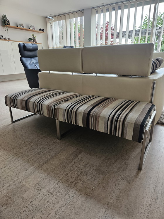 Image 1 of 2x Leolux fauteuils met voetenbankjes