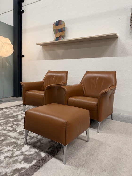 2 Poltrone Leolux Mayuro con pouf Pelle marrone, Arancione (foto 8 di 9)