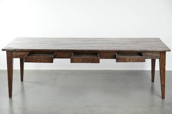 Image 1 of Grote boeren eettafel van sfeervol iepenhout met een prachtig patina uitgevoerd met drie lades
