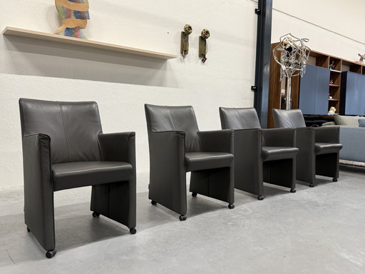 4 Jan Neggers dining chairs on wheels gray leather