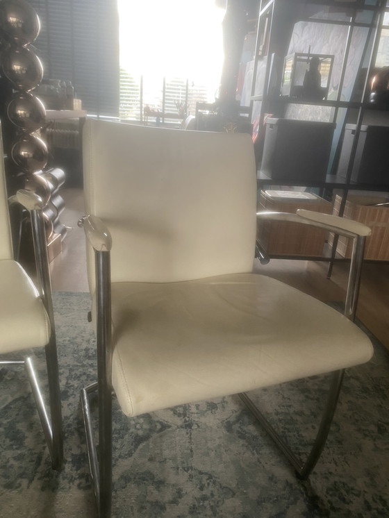 Image 1 of Nomada vintage kalfsleren eetkamerstoelen crème wit 