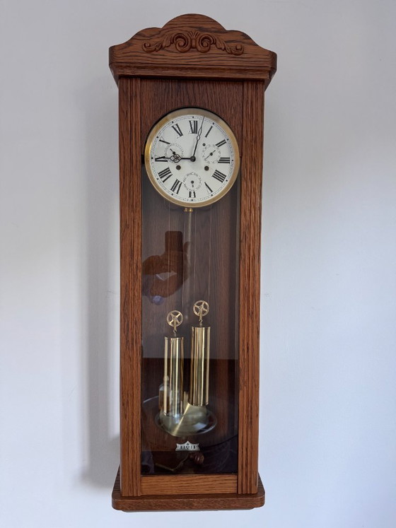 Orologio da parete classico con regolatore a corda, calendario annuale completo e 5 lancette. – Hermle, Wood (photo 5 of 7)