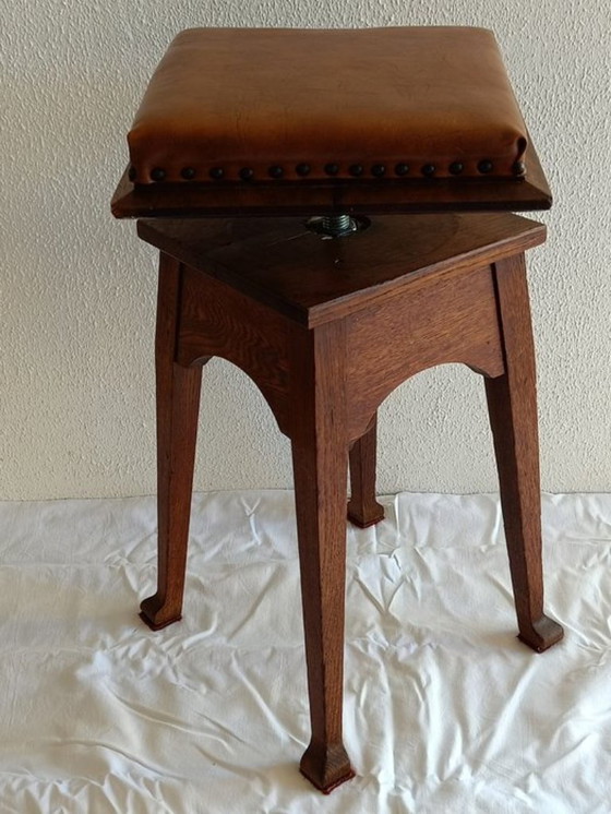 Image 1 of Antica sedia da pianoforte regolabile. Scuola di Amsterdam