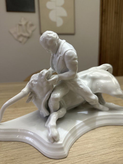 Vintage porcelain sculpture – bull with figure – missing one horn – classic white decorative object