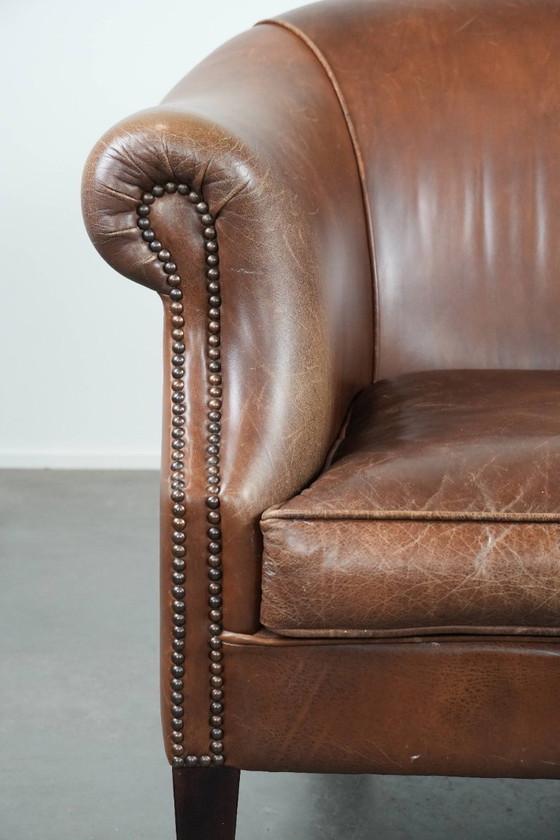 Image 1 of cognac kleurige vintage rundleren clubfauteuil in Engelse stijl 