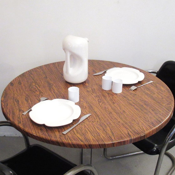 Image 1 of In hoogte verstelbare ronde tafel, jaren 60