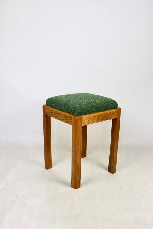 Grüner Bouclé-Hockersitz