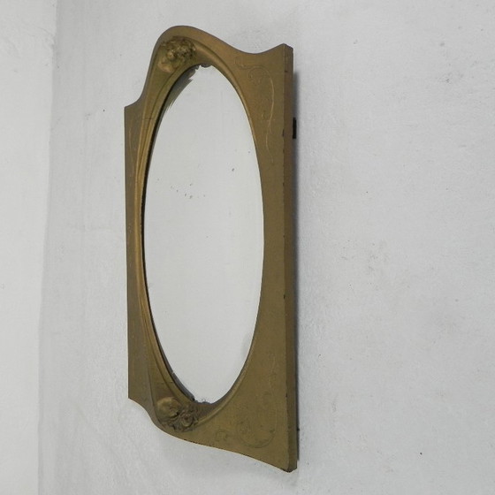 Image 1 of Gold oval mirror with cut edge, 1950s