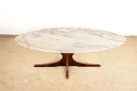 Image 1 of Oval coffee table in Carrara marble and rosewood by Hugues Poignant 1960.