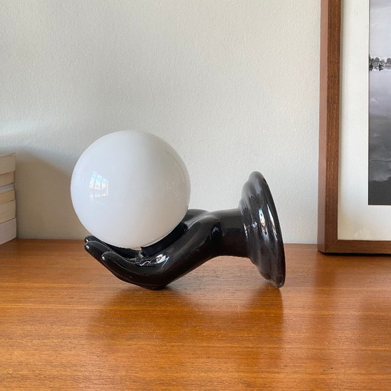 Image 1 of Pair of black ceramic hand-shaped wall sconces from the 70s and 80s