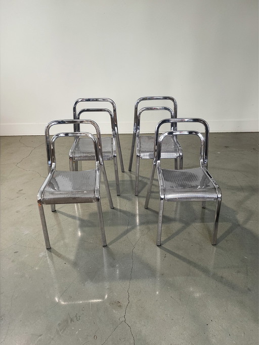 Set di 4 sedie da pranzo di design in metallo cromato Arrben, prodotte in Italia, impilabili.