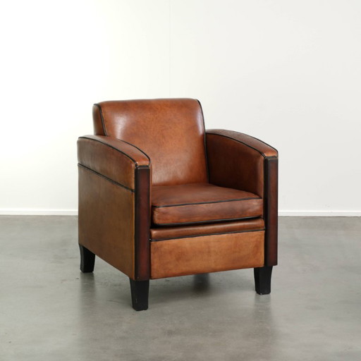 Fauteuil design Art Déco très intéressant en cuir de mouton avec un superbe design et de belles couleurs