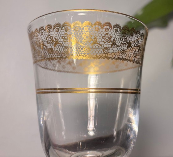 Image 1 of application Baccarat en or sur verre cristal