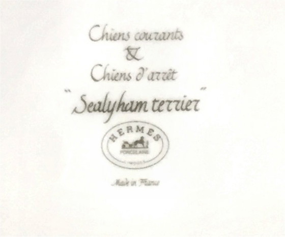 Image 1 of Hermès Paris – Assiette décorative en porcelaine Série « Chiens courants & Chiens d’arrêt » – Sealyham Terrier