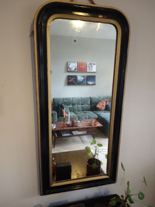 Antique black and gold wall mirror from approx. 1880