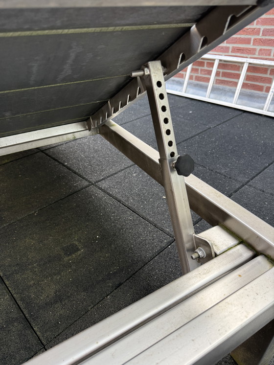 Image 1 of Chaise longue unique en acier inoxydable avec des planches composites solides