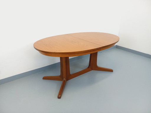 Vintage Baumann oval teak dining table from the 1960s/70s with extensions