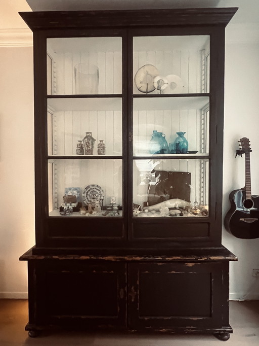 Characterful antique display cabinet with a weathered finish