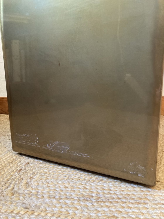 Image 1 of Electro-galvanized metal seat, brass effect. Pharrell Williams / Louis Vuitton fashion show, 2024