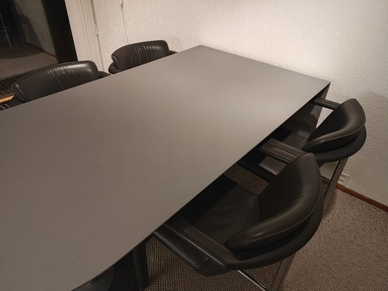 Image 1 of Dining room table with 4 leather chairs